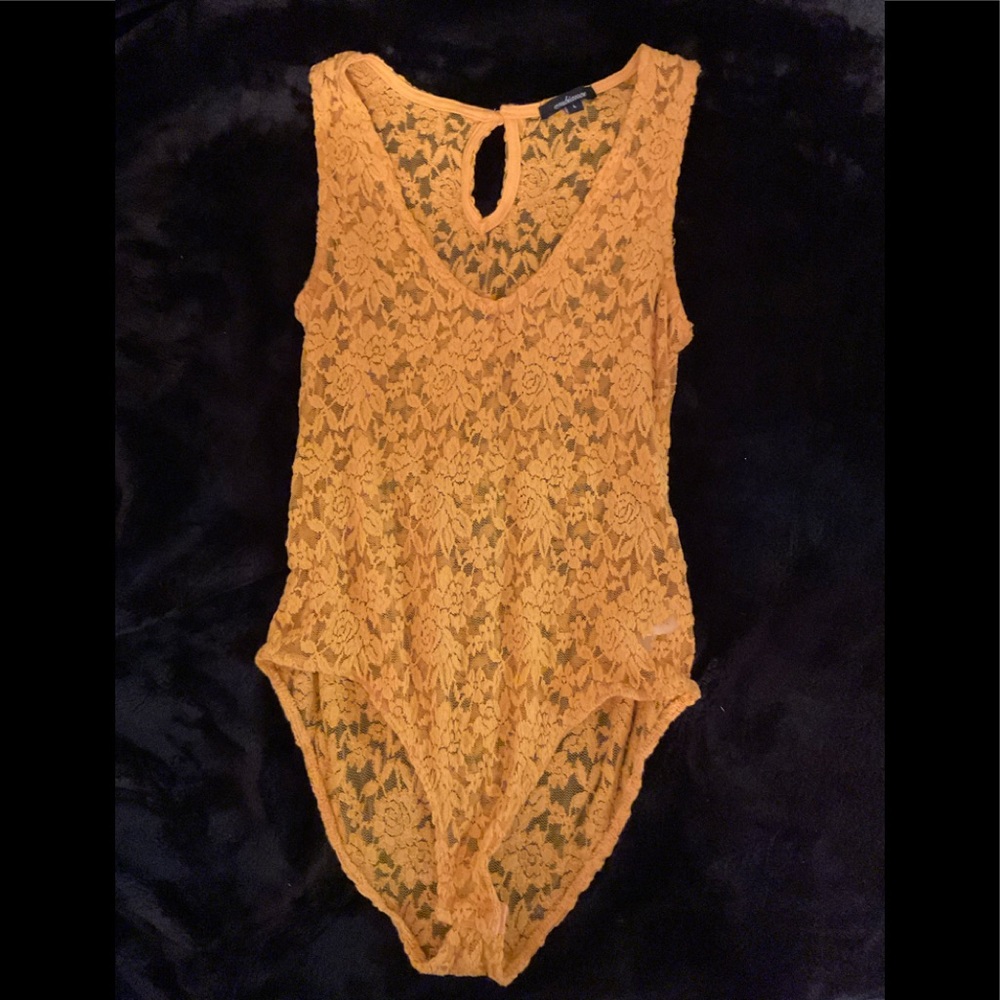 Yellow lace body suit